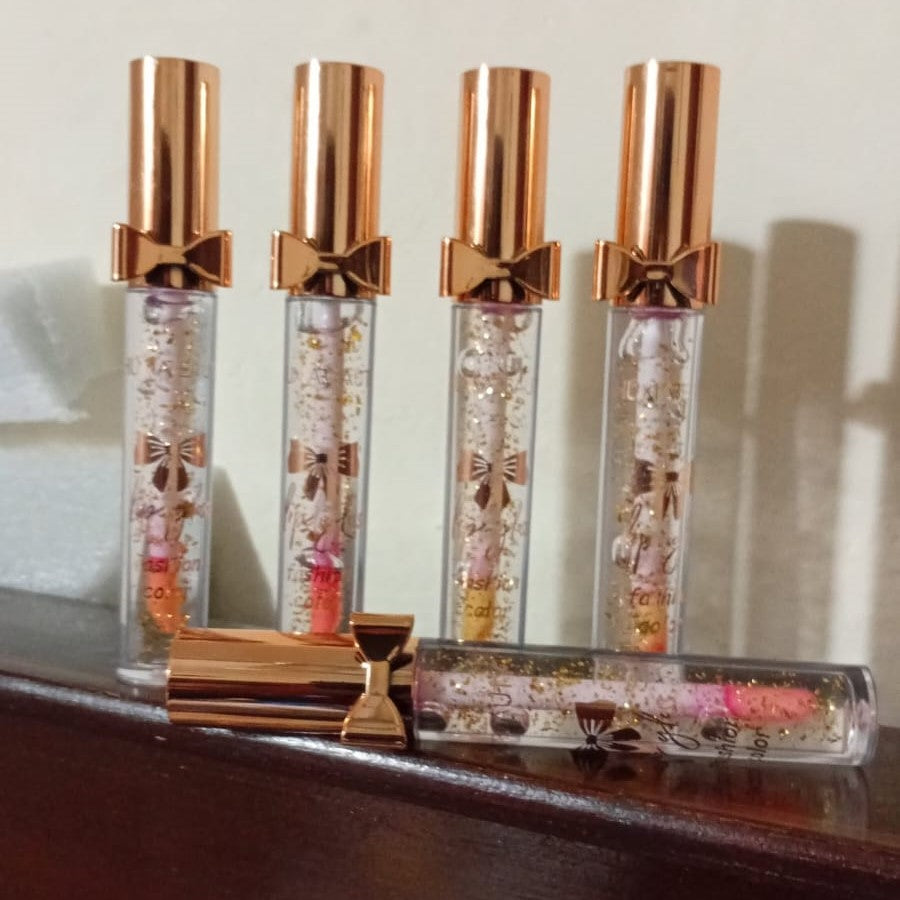 Luxury Pink Glossy Lip Oil With Gold Flakes High Shine Moisturizing Formula